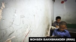 Undated photo of Afghan refugee children in an informal school in Iran.