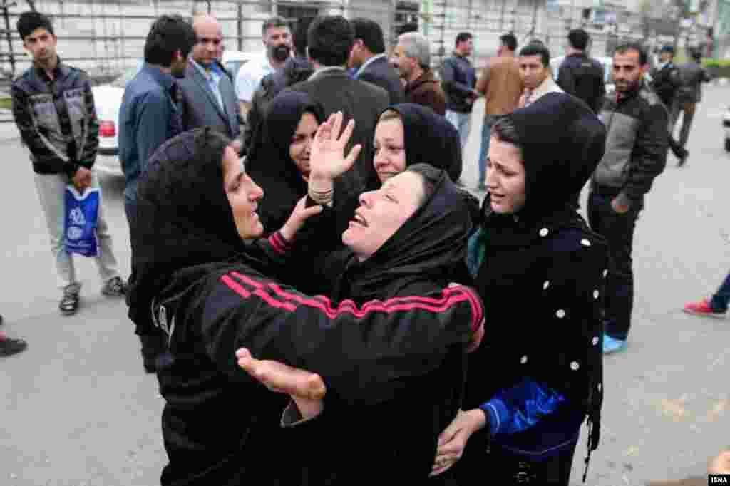 Relatives of Balal embrace. The pardon does not mean that he will be freed; the victim&#39;s family only have the right to call off the execution.