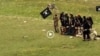 Afghan civilians are often targeted in attacks by Taliban and other militants. Here grab from a video that shows militants loyal to the Islamic State (IS) blowing up bound and blindfolded Afghan prisoners with explosives in the eastern Afghan province of Nangarhar in August 2015.