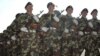 Kyrgyz soldiers marching in a military parade at Bishkek's Central (Alatoo) Square to mark the first anniversary of the toppling of Askar Akaev, 24Mar2006