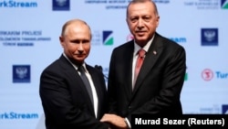 Russian President Vladimir Putin (left) and Turkish leader Recep Tayyip Erdogan plan to meet again "soon."
