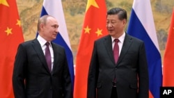 Президент России Владимир Путин и лидер Китая Си Цзиньпин. 4 февраля 2022 года. Во время этого визита Путина в Пекин был заключен договор о «безграничном» партнерстве