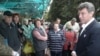 Boris Nemtsov speaks to potential voters in Sochi on April 19, 2009.