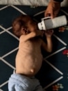 "I feed him boiled water" says Gaza mother amid dire shortages

